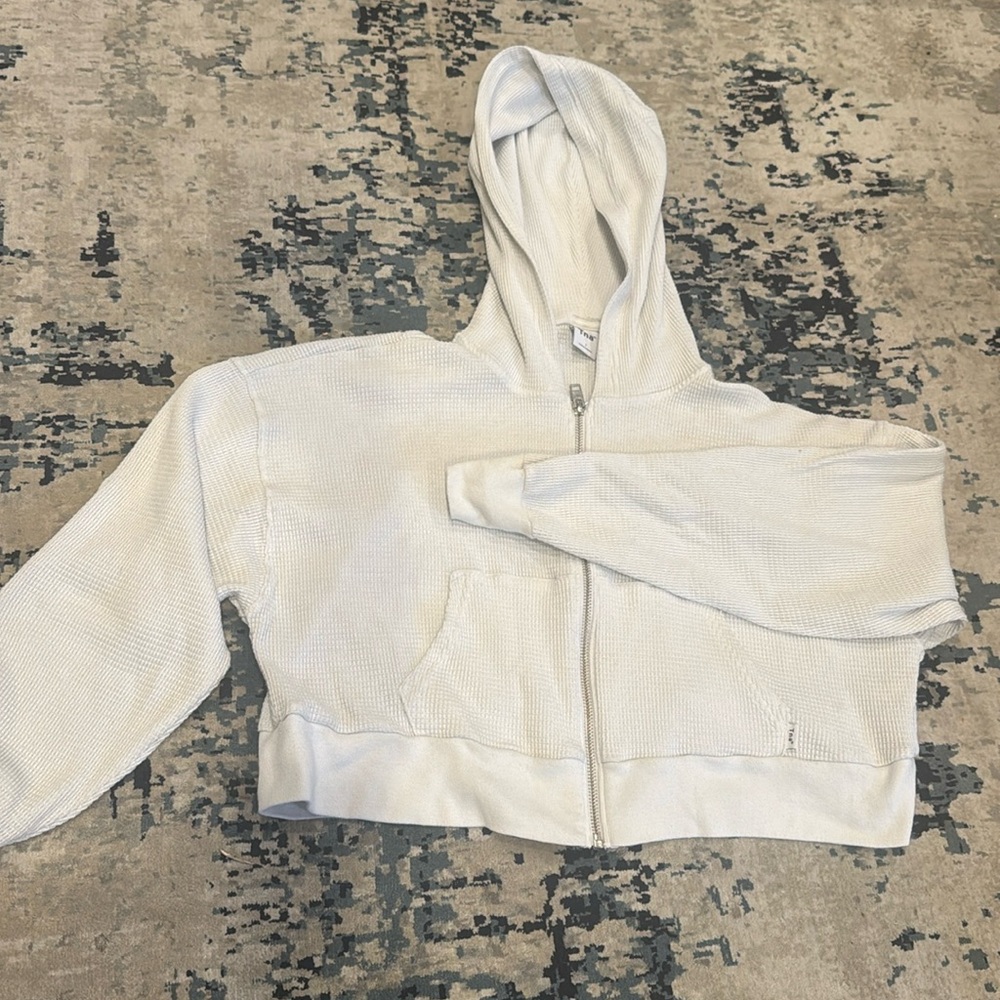 TNA zip up